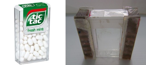 Caixa das balas de menta Tic-Tac usada como cubeta